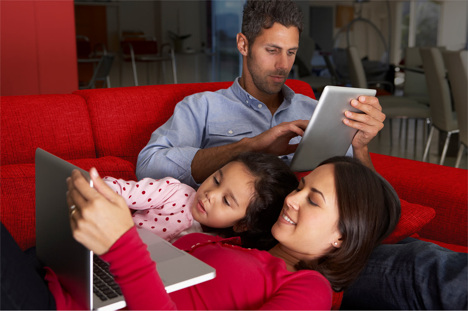 Family using fibre broadband to watch a film