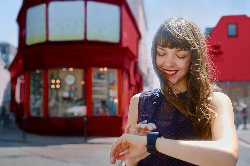 Woman wearing an Android smartwatch